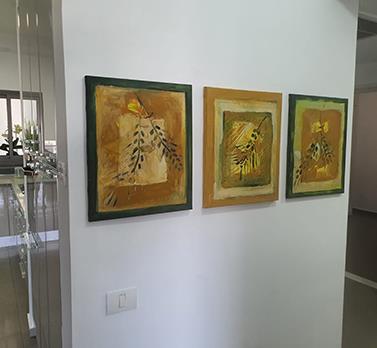 תליית תמונות מקצועית כולל מדידות במד לייזר
