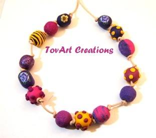 מחרוזת שובבה בסגולים / SOLD